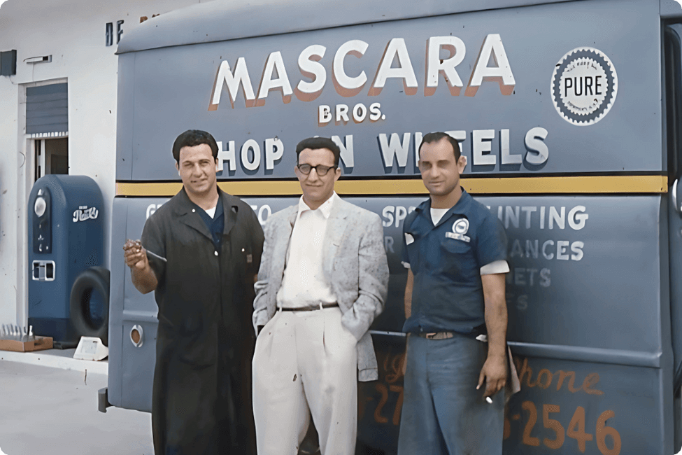 The Mascara cousins in front of their 1950s Shop on Wheels service truck in Florida